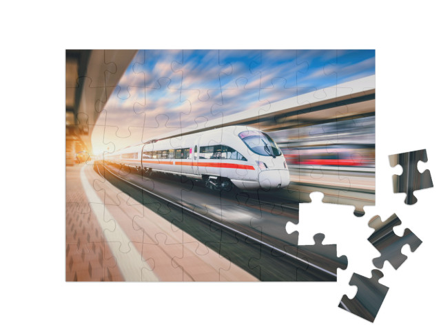 puzzle 48 dílků „Vlak ICE projíždí stanicí“