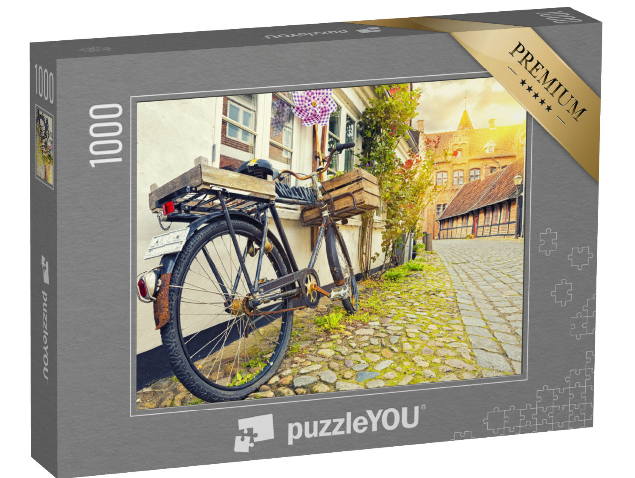 puzzle 1000 dílků „Historické kolo před zdí domu při západu slunce v Ribe“