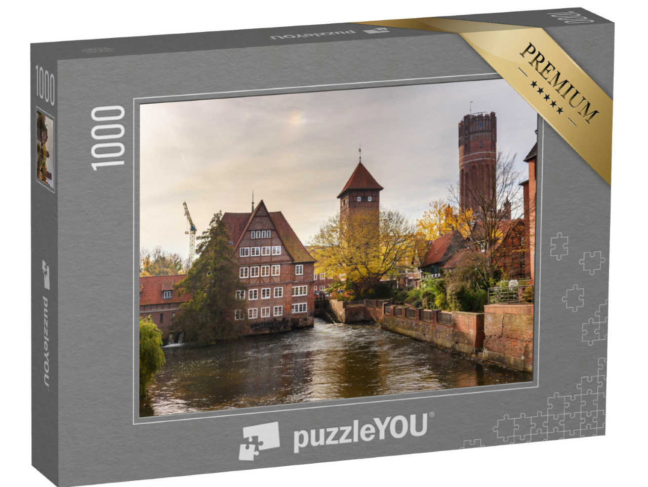 puzzle 1000 dílků „Ratsmühle neboli starý vodní mlýn a vodárenská věž na řece Ilmenau, Lüneburg“