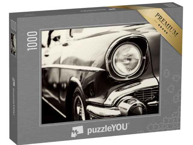 puzzle 1000 dílků „Červené historické auto s detailním záběrem na světlomety“