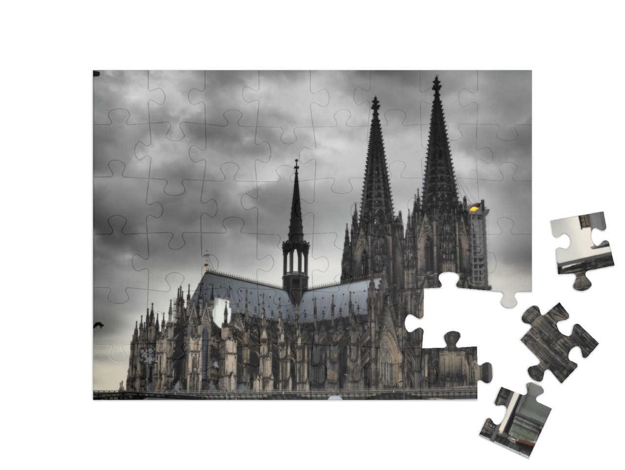 puzzle 48 dílků „Kolínská katedrála pod temnými mraky“