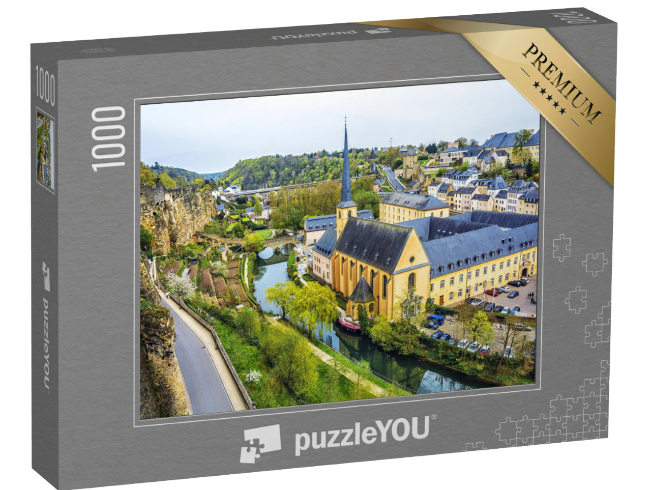 puzzle 1000 dílků „Panoramatický pohled na Lucemburk s řekou Alzette a kostelem St Jean du Grund“
