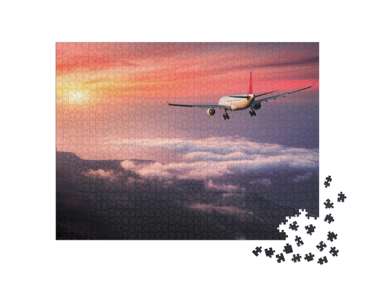 puzzle 1000 dílků „Letadlo na červené večerní obloze nad mraky“