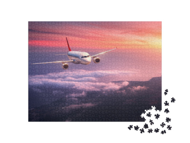 puzzle 1000 dílků „Osobní letadlo letící po rudé večerní obloze“