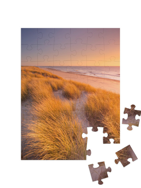 puzzle 48 dílků „Západ slunce nad dunami Texelu v Nizozemsku“