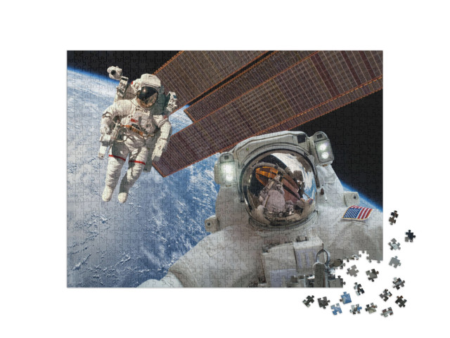 puzzle 1000 dílků „Mezinárodní vesmírná stanice a astronauti ve vesmíru nad planetou Zemí“