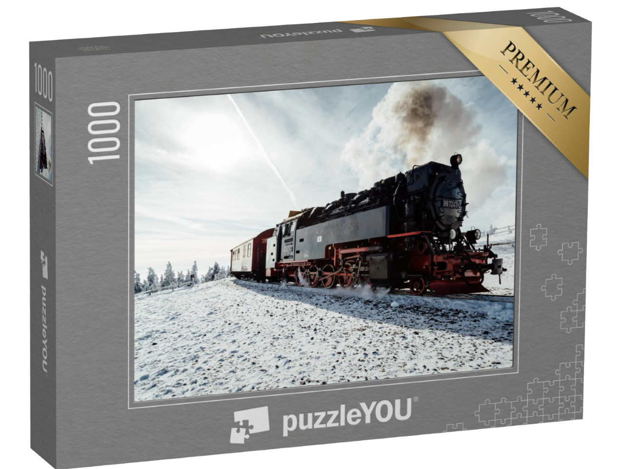 puzzle 1000 dílků „Parní vlak v zimě na Brockenu, Harz“