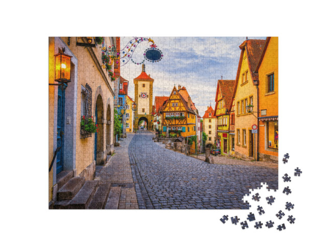puzzle 1000 dílků „Ranní pohled na Untere Schmiedgasse v Rothenburgu ob der Tauber, Bavorsko“