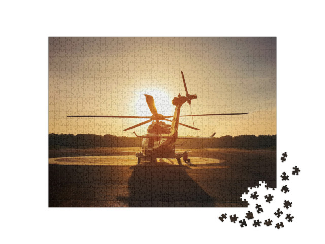 puzzle 1000 dílků „Vrtulník na přistávací ploše při západu slunce“