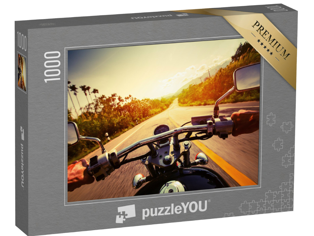 puzzle 1000 dílků „Volně jedoucí motocyklista na prázdné silnici“