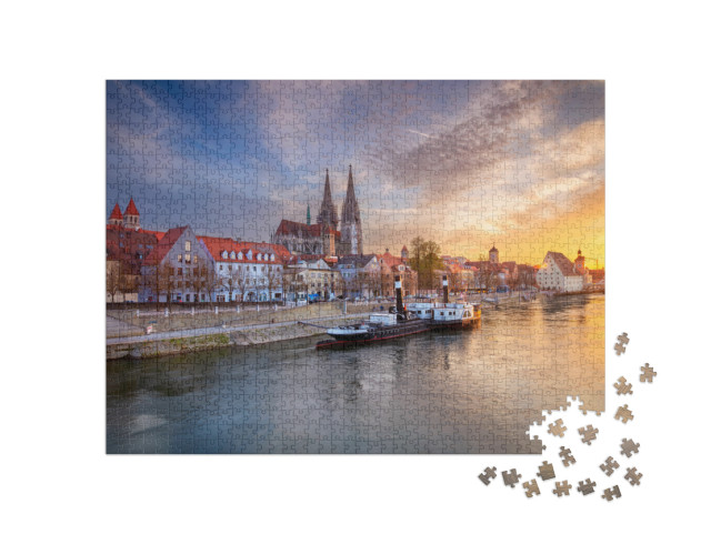 puzzle 1000 dílků „Regensburg na jaře: západ slunce nad městem, Bavorsko“