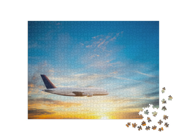 puzzle 1000 dílků „Klidný let osobního letadla na večerní obloze“