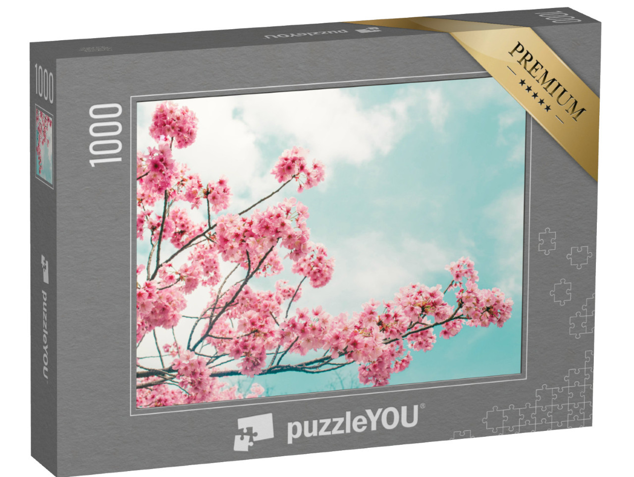 puzzle 1000 dílků „Krásně rozkvetlá třešňová větev před modrou oblohou“