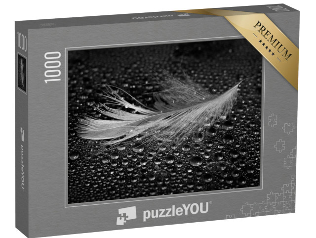 puzzle 1000 dílků „Lehké pírko uprostřed kapek vody“