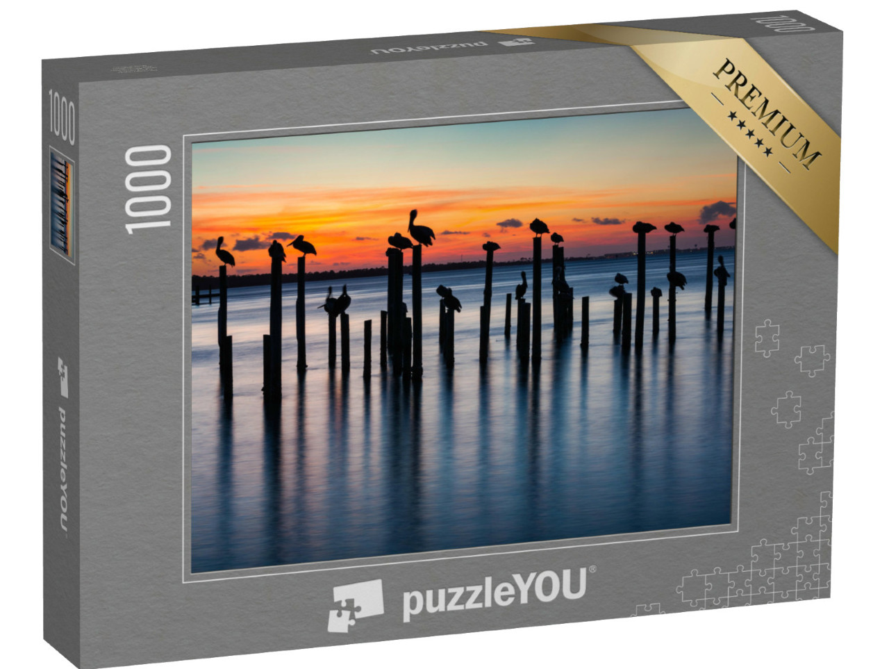 puzzle 1000 dílků „Pelikáni při západu slunce na starých sloupech“