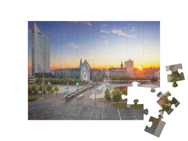 puzzle 48 dílků „Krajina Lipska: Centrum města při západu slunce“