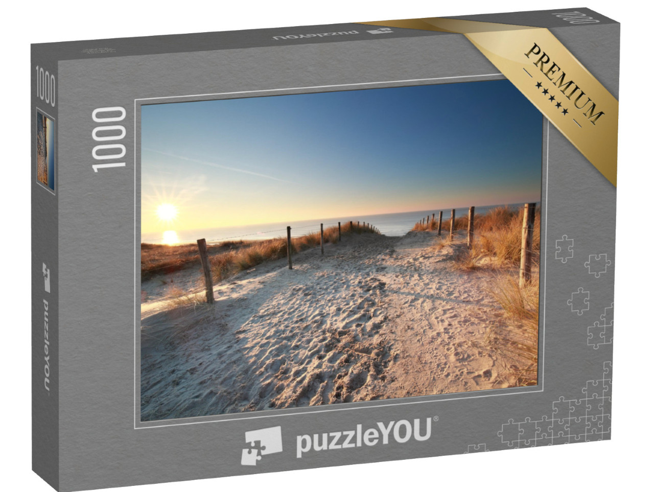 puzzle 1000 dílků „Sluneční světlo nad písečnou cestou na pláž Severního moře, Holandsko“