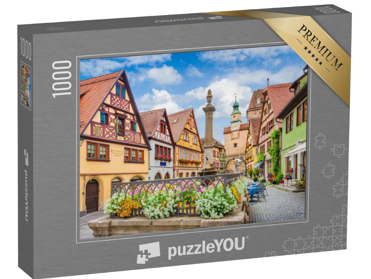 puzzle 1000 dílků „Rothenburg ob der Tauber v létě s modrou oblohou“