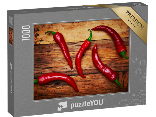 puzzle 1000 dílků „Několik chilli papriček na stole“
