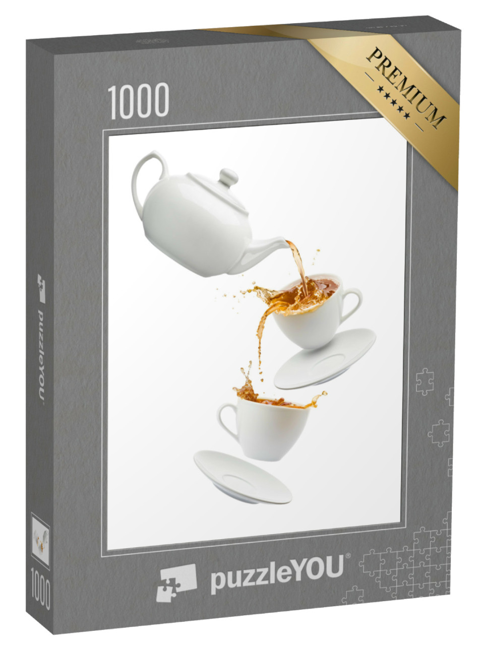 puzzle 1000 dílků „Konvice nalévající čaj do létajících šálků na bílém pozadí...“